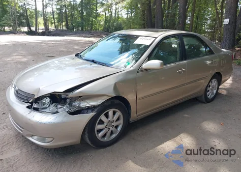 2003 Toyota Camry Xle z USA, uszkodzony, nr VIN JTDBE30K730164346
